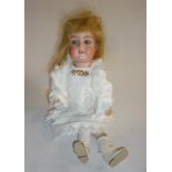 An Armand Marseille Floradora bisque head doll with blue glass sleeping eyes, open mouth and