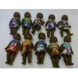 A set of ten black plastic dolls, mid 20th century, 12" high (Est. plus 18% premium inc. VAT)