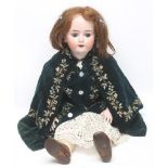 An Alt. Beck & Gottschalk bisque head doll with blue glass sleeping eyes, open mouth and teeth,