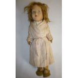 A Farnell Alpha Toys with painted felt covered head, blonde mohair wig, velvet covered limbs, in