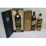 One bottle Johnnie Walker Centenary Blend 18 year old Scotch (boxed), one bottle Johnnie Walker Blue