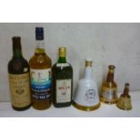 One bottle Golden Bells DeLuxe 12 year old blended, one bottle Q.E.2 blended (W.P. Lowrie & Co Ltd),