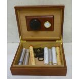 A mahogany humidor, late 20th century, with fitted hygrometer, 9" wide, three cigar cutters, and