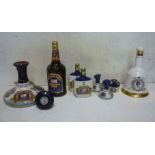 One litre Pusser's British Navy Rum, one litre Pusser's Rum in Wade pottery ship's decanter, two