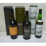 One bottle Caol Ila 18 year old Islay Single Malt, one bottle 2004 Ardbeg Uigeadail Islay Single