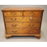 A GEORGIAN OAK CHEST, late 18th century, the moulded edged top over two short and three long