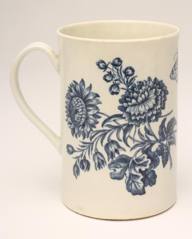 A FIRST PERIOD WORCESTER "NATURAL SPRAYS" PATTERN PORCELAIN MUG, c.1765, of plain cylindrical form