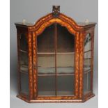 A DUTCH WALNUT AND FLORAL MARQUETRY DISPLAY CABINET, late 18th century, of canted form and wall