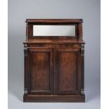 A REGENCY ROSEWOOD CHIFFONIER, the mirrored back with three quarter gallery on reeded turned