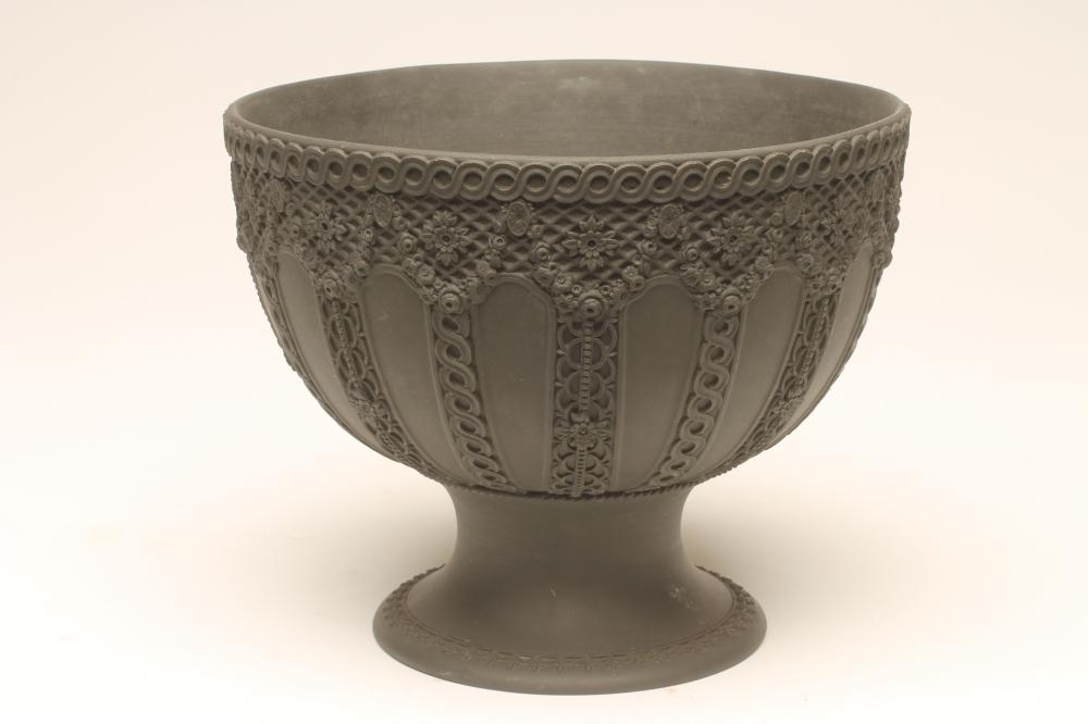 A VICTORIAN WEDGWOOD BLACK JASPERWARE PEDESTAL BOWL, the deep circular bowl with a sprigged rope