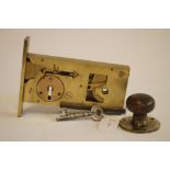 A JOSEPH KAYE BRASS ASYLUM LOCK, with key and knob, from High Royds, Menston, lock plate 3 1/2" x