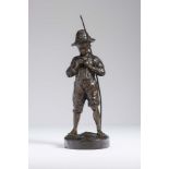 BY AND AFTER A JOLIVEAUX - "Little Boy Fishing", late 19th century bronze figure of a boy standing