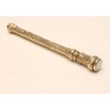 A VICTORIAN GILT METAL TELESCOPIC PENCIL of hexagonal form, unmarked, bright cut engraved with