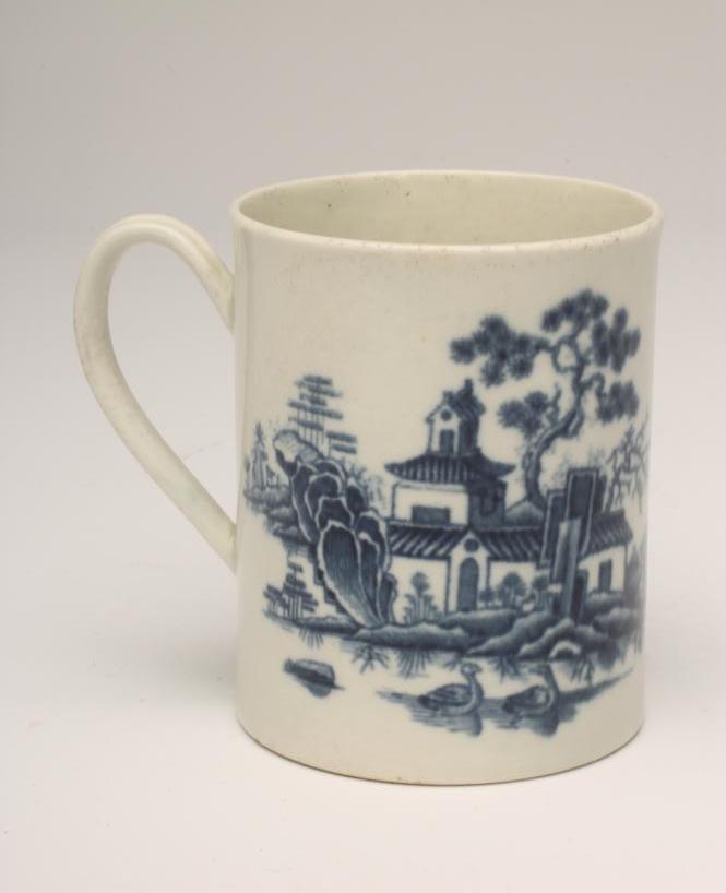 A FIRST PERIOD WORCESTER "PLANTATION" PATTERN PORCELAIN SMALL MUG, c.1775, of plain cylindrical