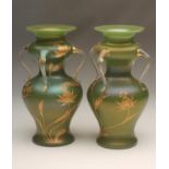 A PAIR OF ART NOUVEAU GLASS VASES, of double inverted baluster form, the iridescent matt green