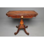 A REGENCY ROSEWOOD AND BRASS INLAID FOLDING CARD TABLE of canted oblong form, the swivel top lined