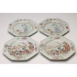 A PAIR OF CHINESE PORCELAIN PLATES of octagonal form, centrally painted in famille rose enamels with