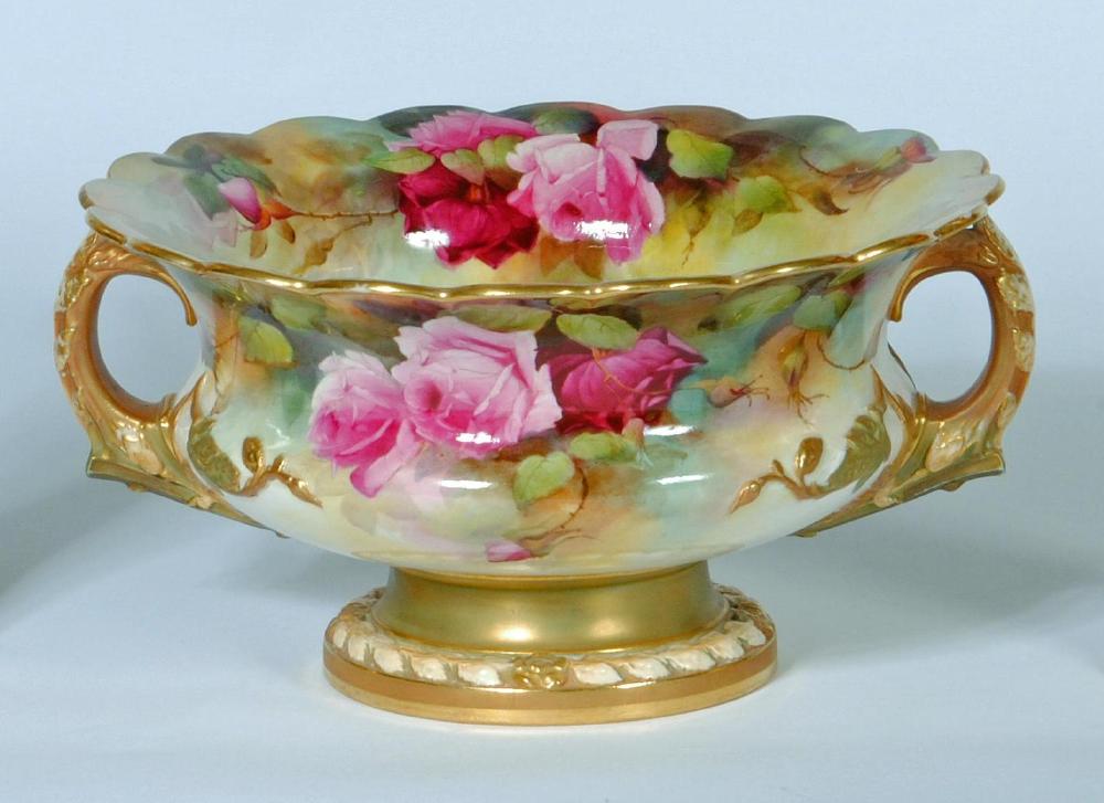 A ROYAL WORCESTER CHINA ROSE BOWL, 1912, of squat baluster form with everted scalloped rim and two