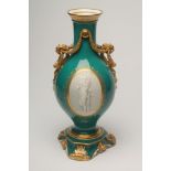 A FRENCH PORCELAIN GARNITURE VASE, mid 19th century, of baluster form, the two scroll handles tied