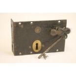 A COLLEDGE & BRIDGEND CAST IRON AND BRASS PRISON LOCK, with key, from Newcastle-upon-Tyne, lock