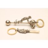 TWO EDWARDIAN SILVER RATTLES, maker Crisford & Norris, Birmingham 1906 (Punch) and 1908 (monkey),