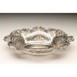 A LATE VICTORIAN SILVER SWEETMEAT DISH, maker Martin, Hall & Co., Sheffield 1895, of shaped oval