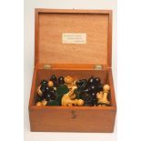 A STAUNTON CHESS SET, in box and ebony, loaded, Kings, 4" high, in a mahogany box with label