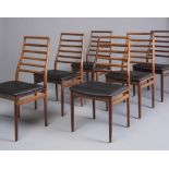 A SET OF SIX DANISH ROSEWOOD DINING CHAIRS by Dyrlund, 1970's, of ladder back form, the tapering