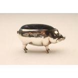 AN EDWARDIAN SILVER NOVELTY PIG PIN CUSHION, maker's mark AL Ld., Birmingham 1906, 3 1/4" long (Est.