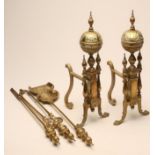 A PAIR OF VICTORIAN BRASS ANDIRONS in Renaissance revival style, the square central stem