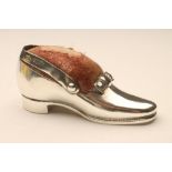 A LATE VICTORIAN LARGE SILVER NOVELTY SHOE PIN CUSHION, maker John Grinsell & Sons, London 1898,