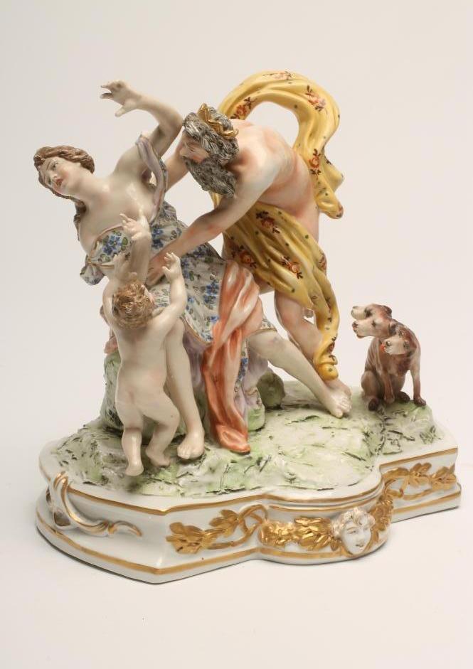 A NAPLES PORCELAIN FIGURE GROUP, 20th century, modelled as "Ratto di Proserpina" with Cerberus, on a