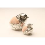 TWO SILVER NOVELTY CHICK PIN CUSHIONS, maker Sampson Mordan, London 1924, 2 1/4" high, and Chester