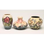 THREE MOORCROFT VASES, various dates, comprising a squat globular vase tubelined and painted by