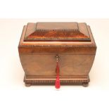 A REGENCY MAHOGANY DECANTER BOX of sarcophagus form with bead and reel edging, hinged lid opening to