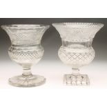 A GLASS CAMPANA URN with diamond and strawberry cut bands raised upon a hexagonal low stem and