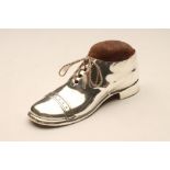 A LARGE SILVER NOVELTY BOOT PIN CUSHION, maker Blankensee & Son Ltd., Birmingham 1920, with