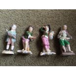 Four continental porcelain figurines some a/f 9cms high.