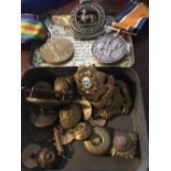 WW1 service medals x 2 for 2nd. Lieutenant E Parker in tin box with cap badges etc
