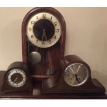 Large dome top walnut cased wall clock, a Napoleon's hat oak mantle clock and another oak mantle