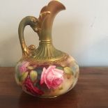 Royal Worcester ewer with gilt dragon handle finely painted with roses signed H Martin dated 1909