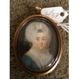 Early 19thC portrait miniature on ivory, a lady in a lace headdress, 4cms