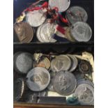 Money tin and contents of commemorative medals etc