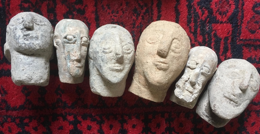 Six pottery heads