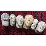 Six pottery heads