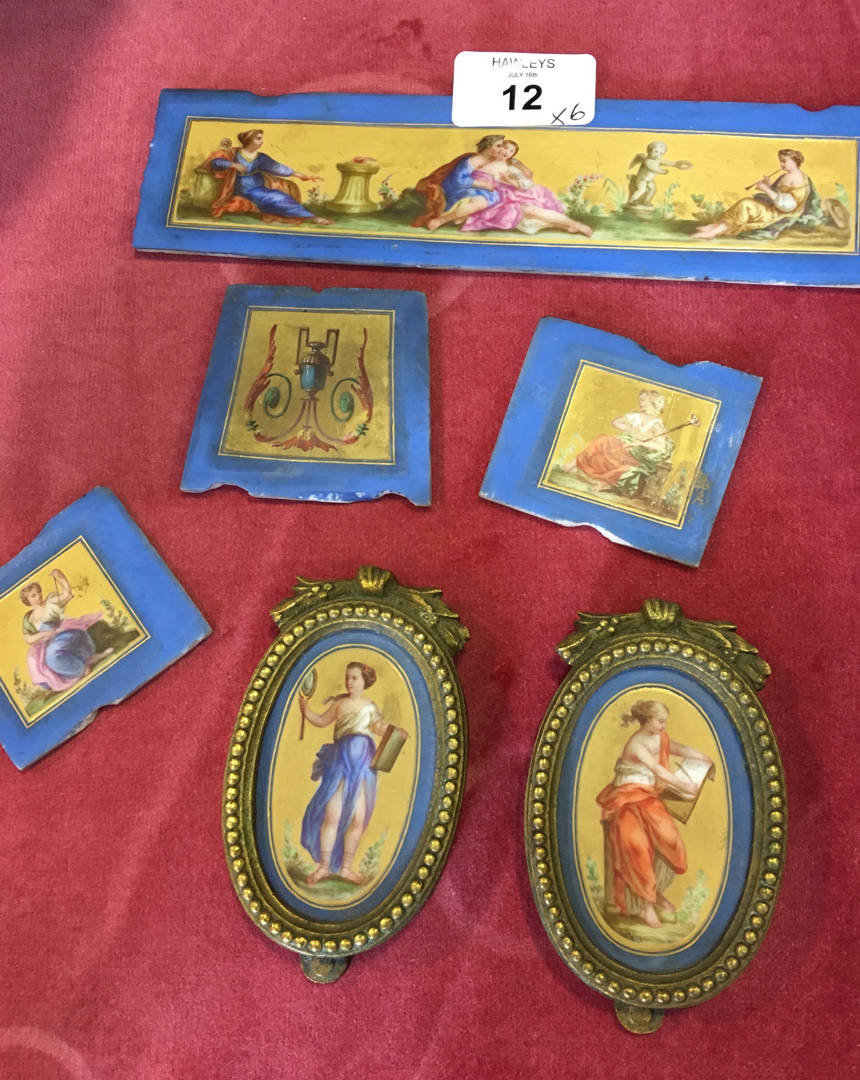 Six small hand painted porcelain plaques
