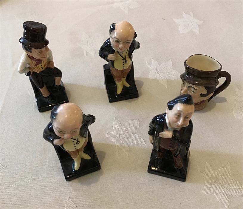 Four Royal Doulton Dickens figures and a Sam Weller miniature Toby jug