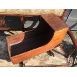 Vintage mahogany doll's cradle