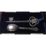 Ceremonial B'ham silver key in case & small rat tail Britannia standard spoon 1900