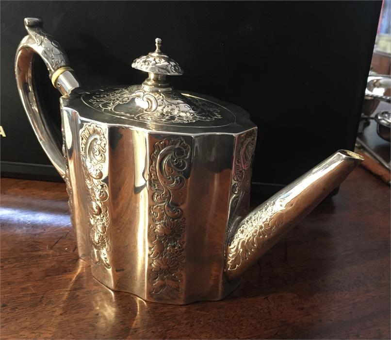 Georgian silver teapot of ovoid form with embossed decoration